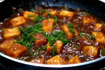 garnish with spring onion or chopped coriander leaves