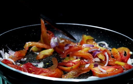 saute-tomatoes-with-spatula