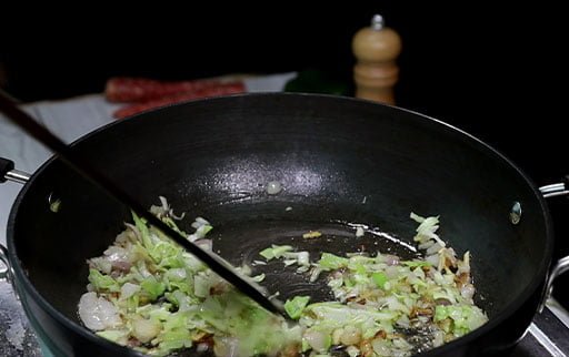 fry-cabbage-onion-ginger-garlic-with-spatula