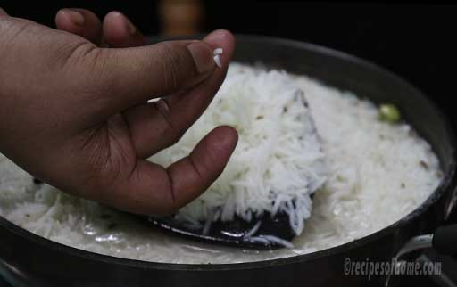 check-the-rice-by-pressing-in-fingers