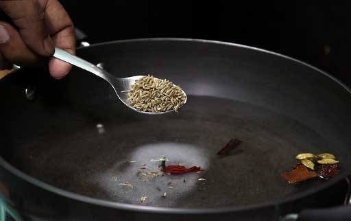 cook-biryani-rice-in-water-with-salt-clove-cardamoms-mace-cumin-seed-rose-water-kewra-water-cinnamon