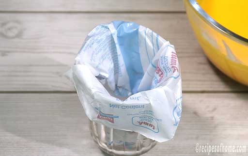 fit-used-milk-packet-in-glass