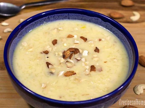 rice-kheer-recipe-sprinkle-with-chopped-dried-fruits-in-blue-ceramics-bowl