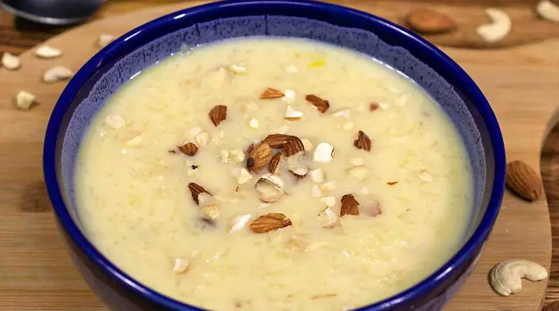rice-kheer-recipe-sprinkle-with-chopped-dried-fruits-in-blue-ceramics-bowl
