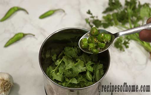 coriander leaves,pudina leaves,green chili,chopepd onion in a blender