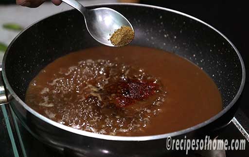 add a teaspoon of turmeric powder,red chili powder