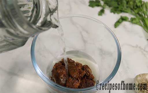 pour warm water with tamarind