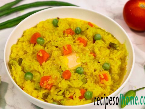 moong dal khichdi recipe serving on white bowl