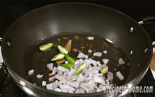 saute chopped onions and green chili