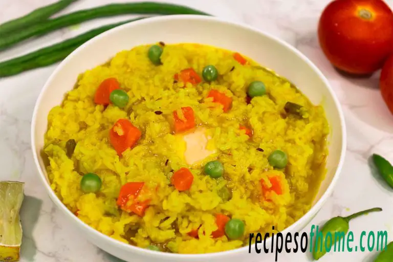 moong dal khichdi recipe serving on white bowl