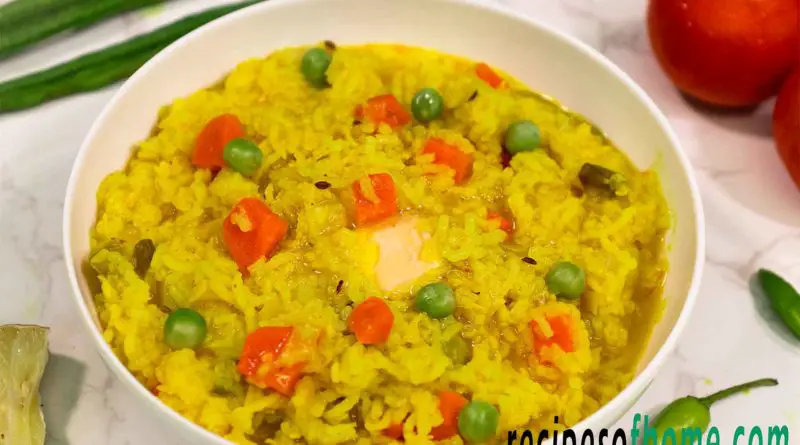 moong dal khichdi recipe serving on white bowl