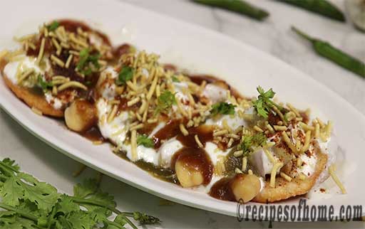 garnish papdi with chopped coriander leaves and sev