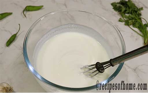 beat curd with pinch of salt and sugar
