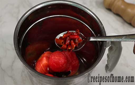 blend tomatoes red chili and dash of water together
