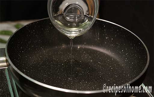 pour oil in a pan