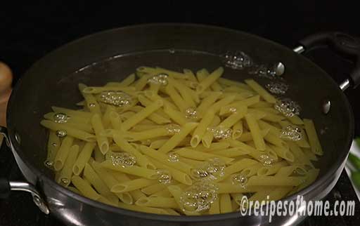 add penne pasta in boiling water