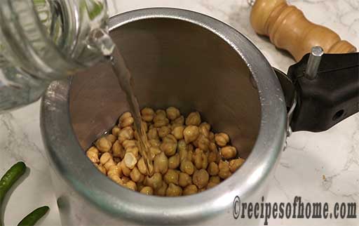 pour chana dal and water in pressure cooker
