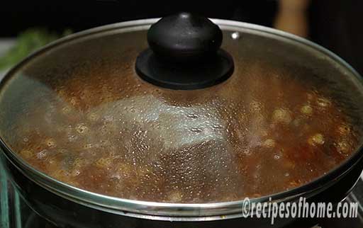 cover the pan and simmer chana masala gravy