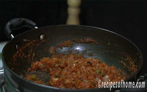 cook spicy tomato onion mixture till it gets thicken