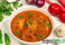 spicy egg curry recipe serve on white bowl,garnsih with freshly chopped coriander leaves