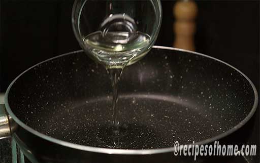 pour oil in a pan