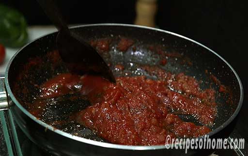 pour tomato puree and cook in medium flame