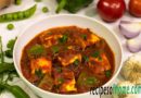 kadai paneer recipe serve in white bowl garnish with fresh coriander leaves
