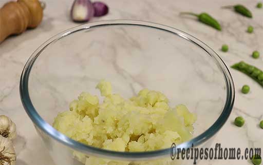 boil potatoes peel and mashed in a bowl