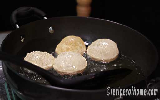 fry puri in oil in medium high flame