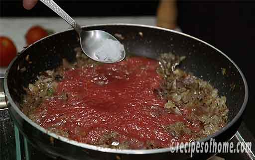 pour tomato puree,sprinkle a tea spoon salt