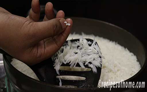 check rice by pressing fingers