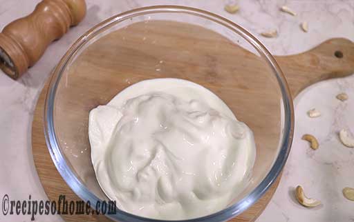 pour chilled fresh cream in a chilled glass bowl