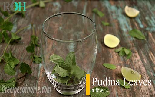 place fresh mint leaves or pudina leaves in a glass