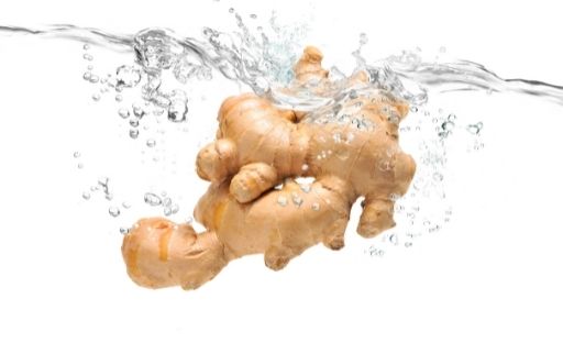 clean ginger in water