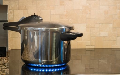 put pressure cooker on high heat