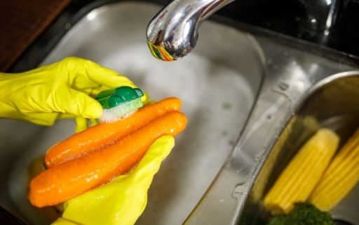 scrub carrots to remove dirt