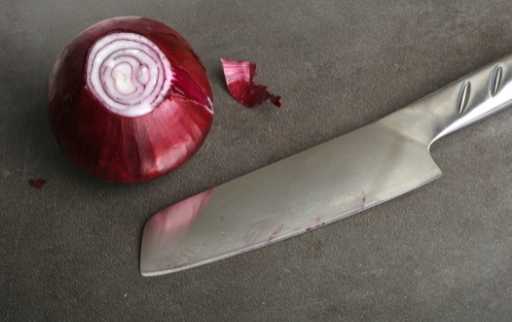cut onion with sharp knife