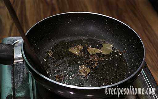 saute bay leaf and cumin seed in pan