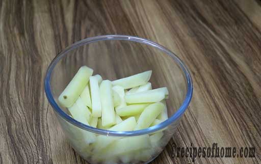 in a bowl add blanch potatoes