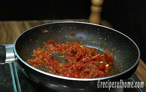 saute tomato onion mixture till it thickens