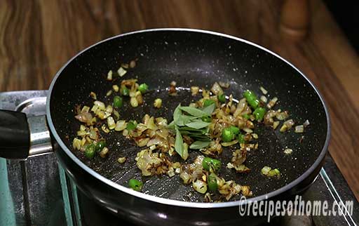 add chopped green chili and fresh curry leaves