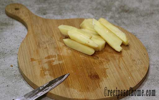 cut the potatoes into vertical sticks