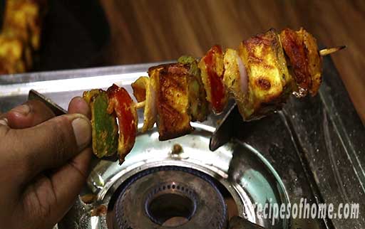 add butter and lemon juice on paneer tikka