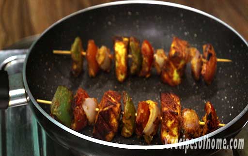 place cooked paneer tikka in a pan
