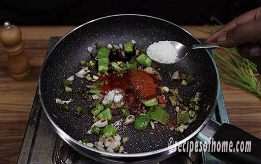 sprinkle red chili powder, salt, sugar