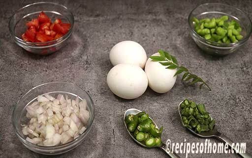 prepare eggs , chop onion, tomato , green chili , curry leaves