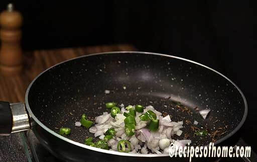 cook chopped onion, green chili