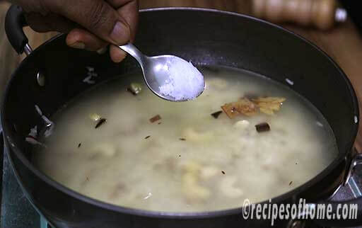 pour water and pinch of salt in kadai