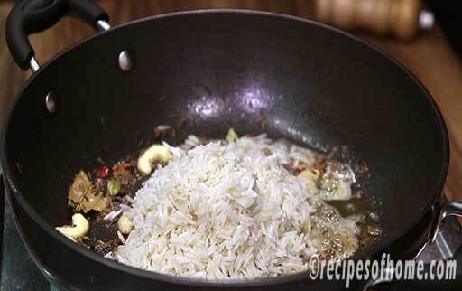 add drained basmati rice in kadai