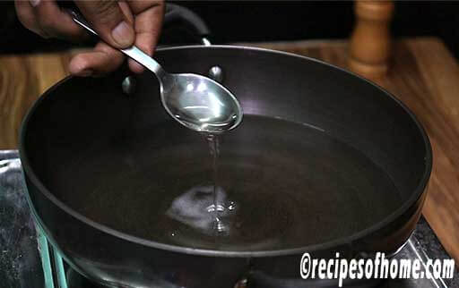 heat water , salt and dash of oil in kadai